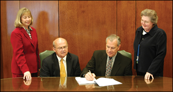 Participating in the signing on behalf of UT were (left to right) Dr. Shirley Hastings, associate dean of Extension; Interim President Dr. Joe Johnson; Dr. Jack Britt, vice for agriculture; and Sandra Shivers, Extension’s TNCEP project director. 