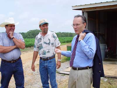 Photo: Dr. John Shumaker and local residents. 